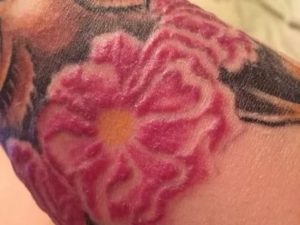 Покраснела тату